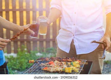Blurred images ,Barbecue party (BBQ) After work to celebrate the success that can achieve sales target. A group of colleagues held a barbecue party (BBQ) and drinking beer to celebrate success. - Shutterstock ID 1939036312