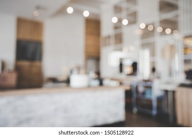 Blurred images of the coffee shop interior background and lighting bokeh