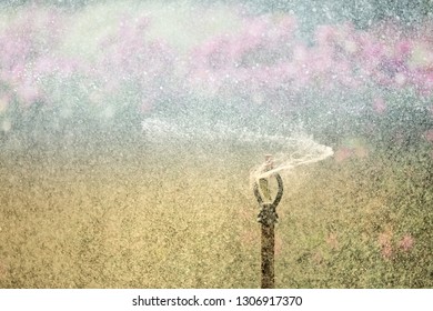 Blurred Images From Water Spray, Dust Prevention Smog City From PM 2.5 Dust. With Bad Weather And Air Pollution.concept For Background Or Copy Space