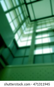 Blurred inside building background.