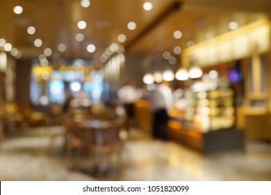 Blurred Interior Background Of A Cafe Or Coffee House. 