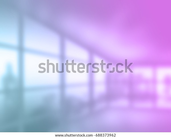 Blurred of interior office room with city\
building background.