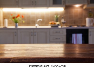blurred kitchen interior and desk space - Shutterstock ID 1090462958