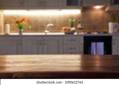 blurred kitchen interior and napkin and desk space - Shutterstock ID 1090612763