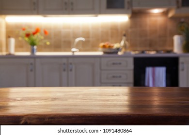 blurred kitchen interior and napkin and desk space - Shutterstock ID 1091480864
