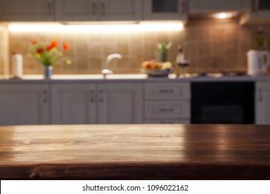 blurred kitchen interior and napkin and desk space - Shutterstock ID 1096022162