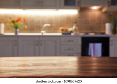 blurred kitchen interior and napkin and desk space - Shutterstock ID 1098657620