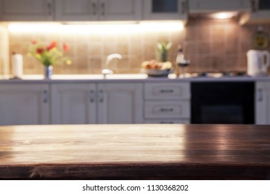 blurred kitchen interior and napkin and desk space - Shutterstock ID 1130368202