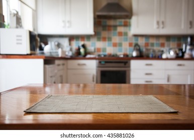 Blurred kitchen interior and napkin and desk space - Shutterstock ID 435881026