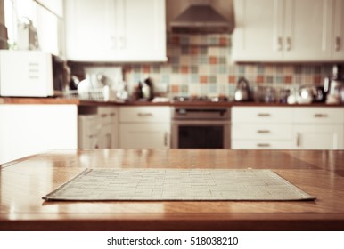 Blurred kitchen interior and napkin and desk space - Shutterstock ID 518038210