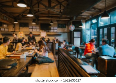 Blurred Of Korean Barbecue Restaurant Full Of People Enjoying A Delicious Dinner