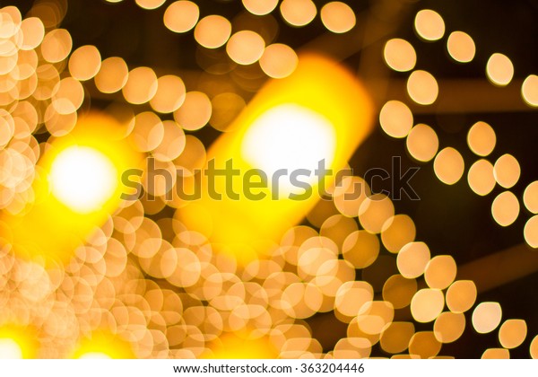 blurred lamp with
light in warm tone
background