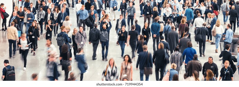 blurred Large crowd of people - Shutterstock ID 719944354