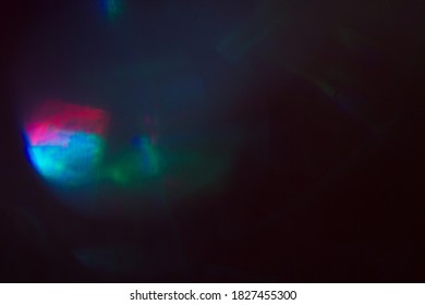 Blurred lens flare. Defocused colorful lights. Shiny glowing spots, abstract background and texture - Shutterstock ID 1827455300