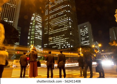 Blurred Light Motion People Walk On Street In The City Night At Shinjuku Tokyo Japan