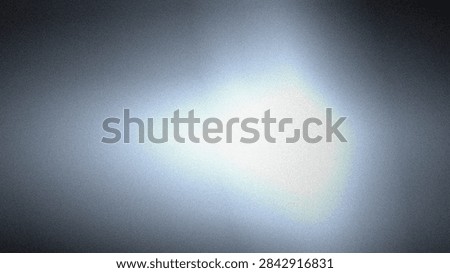 Blurred light source with gradient effect against a dark background