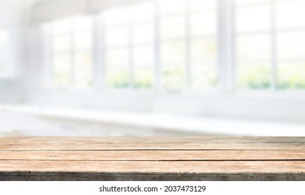 blurred light window background with table - Shutterstock ID 2037473129