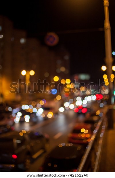 Blurred lights background. De focused/blur\
image of city at night.blurred urban abstract traffic background.\
night traffic blur\
background.