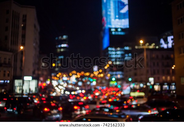 Blurred lights background. De focused/blur\
image of city at night.blurred urban abstract traffic background.\
night traffic blur\
background.