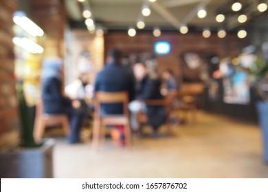 
Blurred lights bokeh at Coffee shop. Some people are discussing together. - Powered by Shutterstock