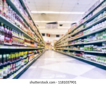 Blurred Low Angle View Variety Of Sauces, Pickled Vegetable, Vinegar, Cooking Wine On Shelves At Asian Grocery Store In Dallas, Texas, America. Defocused Row, Aisles Of Traditional Vietnamese Dressing