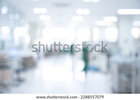 Blurred medical background and the doctor is working
