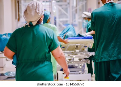 Blurred of medical team moving patient to surgery in operating room at the hospital. 