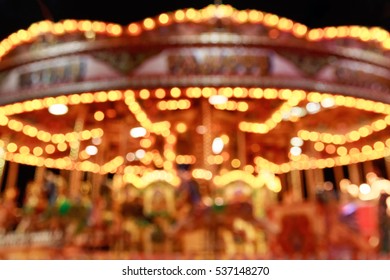 Blurred merry-go-round in Winter Wonderland for background use