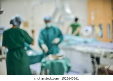 Blurred of modern Cath Lab with doctor, nurse and patient in hospital,patient during  treatment in Cath Lab.