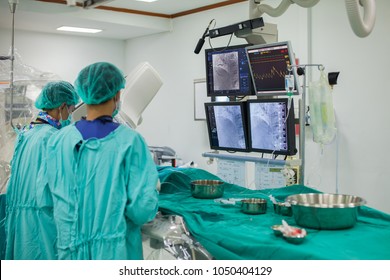 Blurred of modern Cath Lab with doctor, nurse and patient in hospital,patient during treatment in Cath Lab.