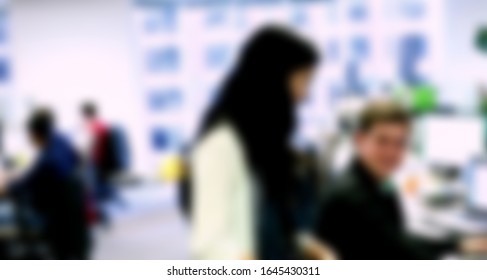 Blurred Motion Of Asian Female Software Engineer On Daily Activity At Office.meeting,making Concept,coding And Presentation. Suitable For Technology Concept.