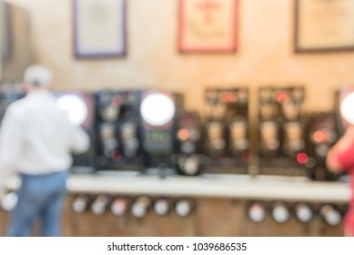 Blurred Motion Customer At Gas Station Coffee Bar Pouring Convenience Cafe. Modern Convenience Store With Row Of Variety Self-service Fresh Hot Coffee Machines Selling Medium Roast, Decaf