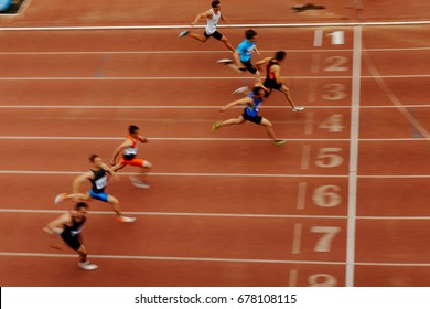 blurred motion finish final sprint of race athlete runners - Shutterstock ID 678108115