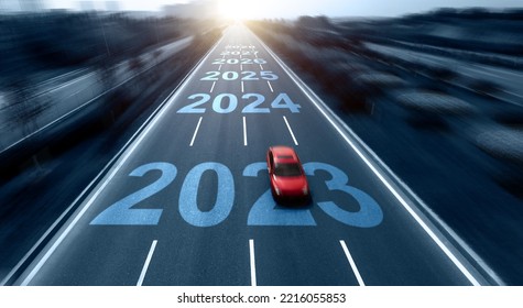 Blurred Motion Highway With Single Red Car, And Number 2023, 2024 To 2028 On The Road