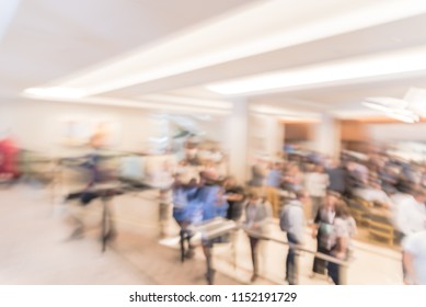 Blurred Motion People Have Happy Hour, Casual Business Meeting At The Lobby Of Luxury Hotel In San Francisco, California, USA. Blurry Abstract Background Industry Networking Event