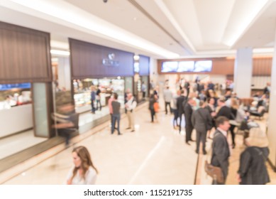 Blurred Motion People Have Happy Hour, Casual Business Meeting At The Lobby Of Luxury Hotel In San Francisco, California, USA. Blurry Abstract Background Industry Networking Event