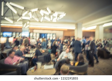 Blurred Motion People Have Happy Hour, Casual Business Meeting At The Lobby Of Luxury Hotel In San Francisco, California, USA. Blurry Abstract Background Industry Networking Event