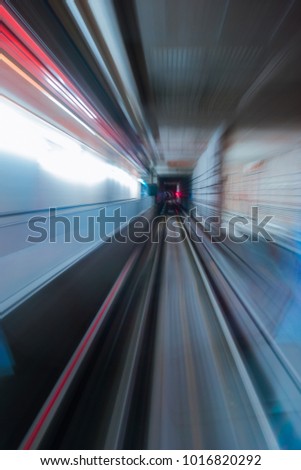 Blurred motion from train speed up from the platform.