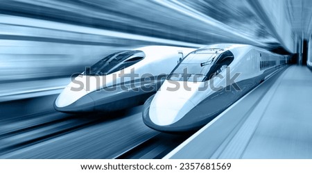 Blurred motion of two modern train speeding
