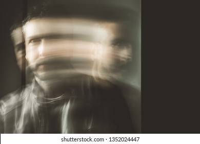 Blurred Movement Effect Man In Motion.Portrait Of A Young Man