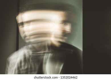 Blurred Movement Effect Man In Motion.Portrait Of A Young Man