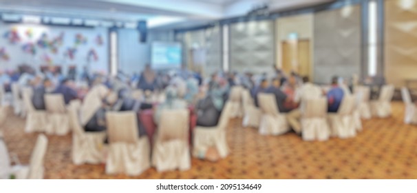 Blurred Multiethnic People In Gala Dinner At Hotel Ballroom.