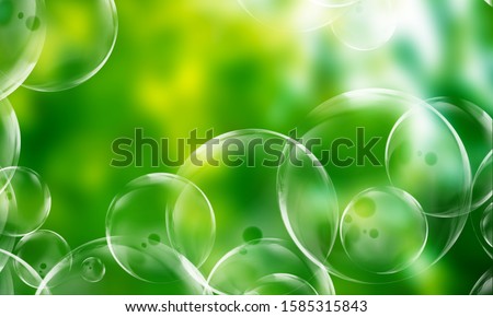 Blurred natural background. blur with bokeh green color abstract bacground.beautiful summer green background and bright soap bubbles. joyful natural background. beautiful flying soap bubble on Sunny.