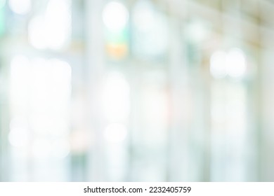 BLURRED OFFICE BACKGROUND, LIGHT BUSINESS HALL WITH WINDOW LIGHT REFLECTIONS, MODERN COMMERCIAL INTERIOR BACKDROP, WHITE DEFOCUSED INSIDE SPACE - Shutterstock ID 2232405759
