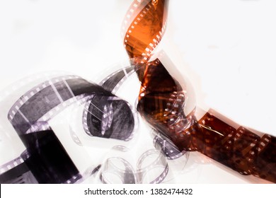 Blurred Old Vintage Brown And Black Films Of Analog Cameras And Camcorders. Concept Video, Creativity And Art. Cinema And Movies. Perforated Negative. Retro Analog Photography And Video. Outdated Tech