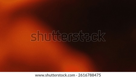 Blurred orange and black gradient background. Abstract texture with light effects. Perfect overlay.
