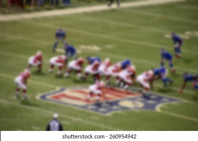 Blurred out of focus background from New York City. New York Giants stadium NFL. American football game players.