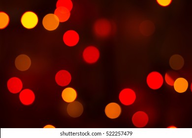 Blurred Or Out Of Focus Red And Yellow Coloured Fairy Lights To Form A Bokeh Background With Space For Copy Or Text.