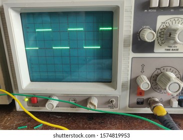 Blurred Output waveforms displayed on a CRO (Cathode Ray Oscilloscope) screen.