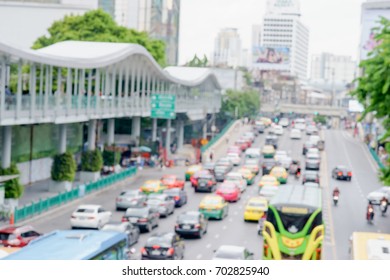 Blurred Over Path Or Sky Walk And Traffic Jam On Ratchadamri Road To Pratu Nam Intersection.